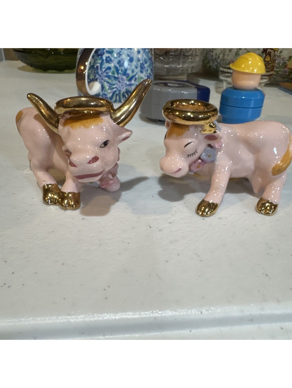 1950s pink and gold ceramic cow and bull salt and pepper shakers